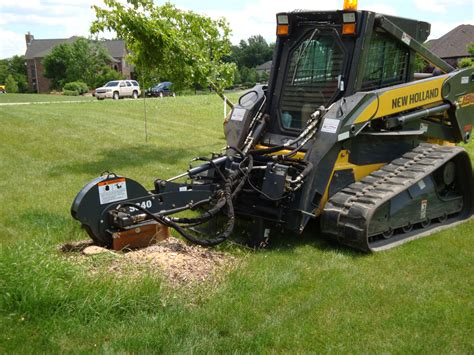 how to remove a tree stump with a skid steer|skid steer attachments stump grinder.